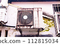 Big old air conditioner compressor source heat pumps on wall outdoor on the roof top of the building for cooling at industrial plant. Dust black and rust, oil cling to air conditioner. safety concept 112815034