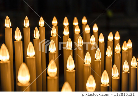 Candle lights burning in St. Peter's Basilica, Vatican, Rome, Italy Candle lights burning in St. Peter's Basilica, Vatican, Rome, Italy 112816121