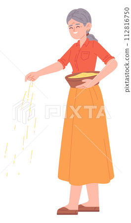 Old woman pouring grain. Farmer lifestyel routine 112816750