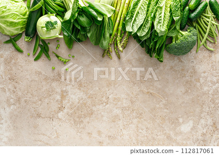 Green vegetable background. Various green vegetables. Veggies. Clean eating, healthy vegetarian, vegan food concept, copy space, top view 112817061
