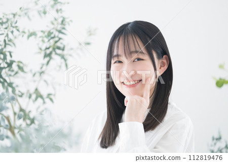 Beauty image of a young Asian (Japanese) woman: Smiling after acne is healed 112819476