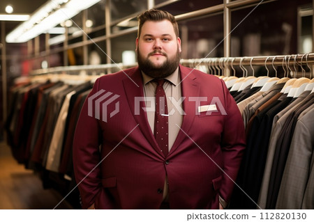 Office worker, beautiful man at workplace. Plus-size manager Office worker, beautiful man at workplace. Plus-size manager 112820130
