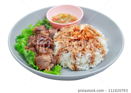 Stewed beef with rice on plate 112820763
