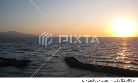 Sunset over the sea 112820999