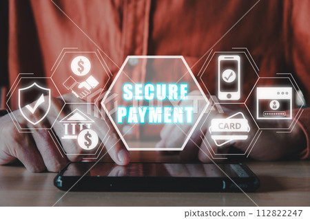 Secure payment concept, Man using smart phone on desk with secure payment icon on virtual screen. 112822247
