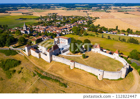 Drone view of French village of Villebois-Lavalette with caslte 112822447