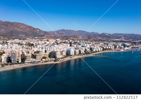 Aerial view of Marbella by Mediterranean coast on sunny day, Spain Aerial view of Marbella by Mediterranean coast on sunny day, Spain 112822517
