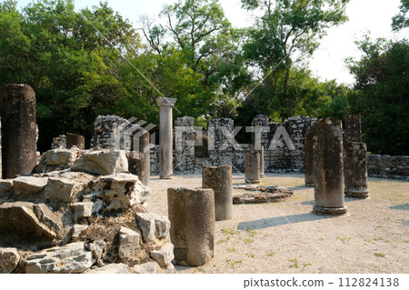 Ruins of Great Basilica in Butrint National Park, Buthrotum, Albania. Triconch Palace at Butrint Life and death of an ancient Roman house Historical medieval Venetian Tower surrounded. High quality Ruins of Great Basilica in Butrint National Park, Buthrotum, Albania. Triconch Palace at Butrint Life and death of an ancient Roman house Historical medieval Venetian Tower surrounded. High quality 112824138