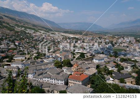 City of Gjirokaster in Southern Albania. Old Town is a UNESCO World Heritage Site. Closeup of Architectural Buildings. City of Gjirokaster in Southern Albania. Old Town is a UNESCO World Heritage Site. Closeup of Architectural Buildings. 112824153