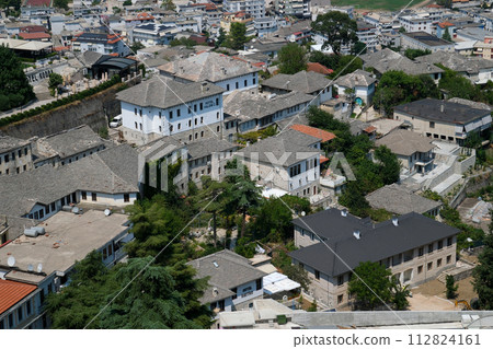 City of Gjirokaster in Southern Albania. Old Town is a UNESCO World Heritage Site. Closeup of Architectural Buildings. City of Gjirokaster in Southern Albania. Old Town is a UNESCO World Heritage Site. Closeup of Architectural Buildings. 112824161