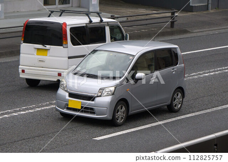 Tall Wagon Light Passenger Vehicle Road Driving Tall Wagon Light Passenger Vehicle Road Driving 112825757