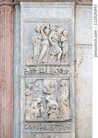 Escape of Loth by Niccolo Tribolo up and Birth of Esau and Jacob by Alfonso Lombardi down, left door of San Petronio Basilica in Bologna, Italy Escape of Loth by Niccolo Tribolo up and Birth of Esau and Jacob by Alfonso Lombardi down, left door of San Petronio Basilica in Bologna, Italy 112826943
