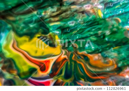 Abstract background of multicolored paint splashes on the water 112826961