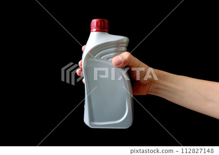 Refueling and pouring oil quality into the engine motor car Transmission and Maintenance Gear .Energy fuel concept. 112827148