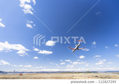 Sendai Airport in early spring, plane landing, Natori City, Miyagi Prefecture 112827295