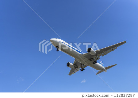 Sendai Airport in early spring, plane landing, Natori City, Miyagi Prefecture 112827297