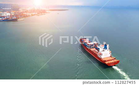 Aerial view of the freight shipping transport system cargo ship container. international transportation Export-import business, logistics, transportation industry concepts Aerial view of the freight shipping transport system cargo ship container. international transportation Export-import business, logistics, transportation industry concepts 112827455