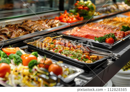 Catering buffet food indoor in restaurant with grilled meat. Catering buffet food indoor in restaurant with grilled meat. 112828385