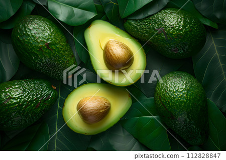 Avocado Symphony: Top View of Luscious Green Ripe Avocado Close-Up 112828847