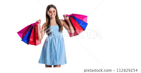 teen girl at shopping on background, copy space. photo of teen girl at shopping with bags 112829254