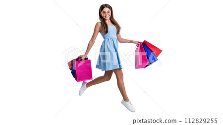 image of teen girl at summer sale with bags. teen girl at summer sale isolated on white. 112829255