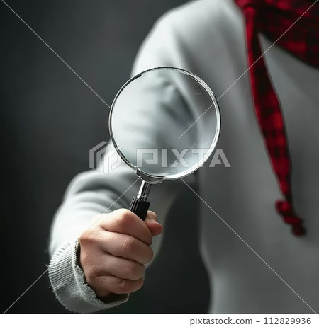 The concept of looking through a magnified glass, searching for relevant information, exploring unknowns in depth, exploring obscurities and mysteries, search for hidden knowledge and truths . 112829936
