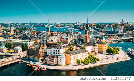 Stockholm, Sweden. Riddarholm Church, The Burial Place Of Swedish Monarchs On The Island Of Riddarholmen. Sunny Cityscape Skyline. Elevated View Of Gamla Stan 112831147