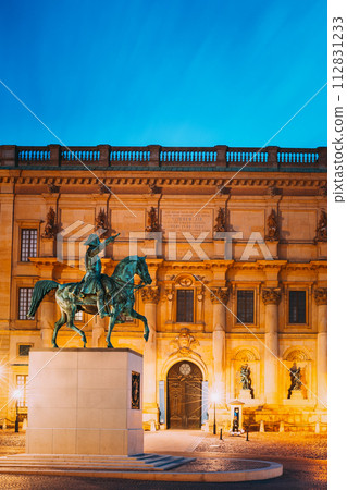 Stockholm, Sweden. Statue Of Former Swedish King Karl XIV Johan Sitting On A Horse Near Royal Palace. Famous Popular Destination Scenic Place In Night Lights 112831233