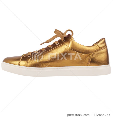 Gold shoe on white background, isolated. Gold shoe on white background, isolated. 112834263