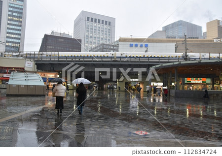 Sleeting in front of Yurakucho Station, Tokyo Sleeting in front of Yurakucho Station, Tokyo 112834724
