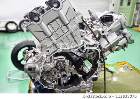 Engine of a large motorcycle under maintenance Engine of a large motorcycle under maintenance 112835076