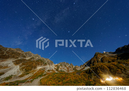 Northern Alps, Karasawa and starry sky with autumn leaves in the moonlight Northern Alps, Karasawa and starry sky with autumn leaves in the moonlight 112836468