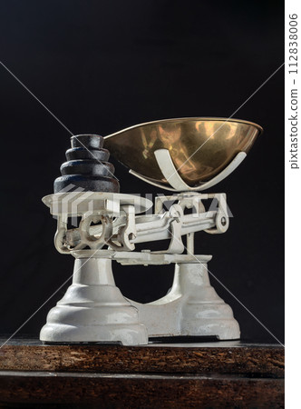 Old obsolete manual weighing scales and Iron Brass Tray with set of cast iron weights. Old obsolete manual weighing scales and Iron Brass Tray with set of cast iron weights. 112838006