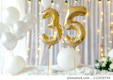 Golden helium floating balloons made in shape of number thirty-five. Birthday party or wedding anniversary for 35 years celebration. Elegant white decorations, generative AI 112838744