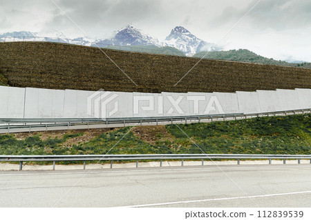 serpentine in mountainous area on Rosa Khutor 112839539