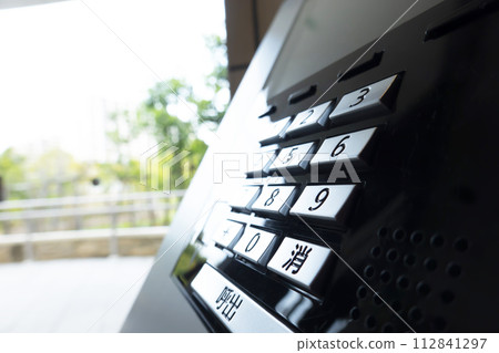 Intercom at the entrance of the condominium Intercom at the entrance of the condominium 112841297