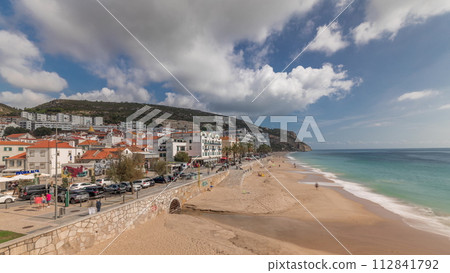Panorama showing aerial view of Sesimbra Town and seaside timelapse, Portugal. 112841792
