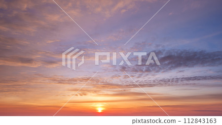 Sunset sky background 112843163