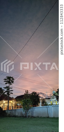 Beautiful twilight and clouds with golden yellow sunlight Beautiful twilight and clouds with golden yellow sunlight 112843333