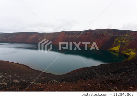 Volcanic crater with water near Landmannalaugar area, Iceland 112843802