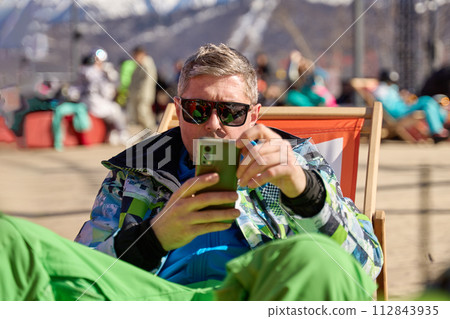 Relaxing Moments at the Ski Resort 112843935