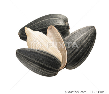 Sunflower seeds pile isolated on white background. 112844040