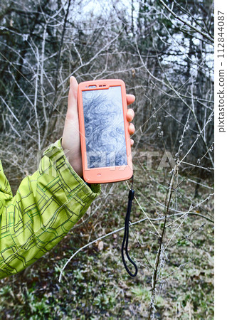 smartphone tracking travel on trails. 112844087