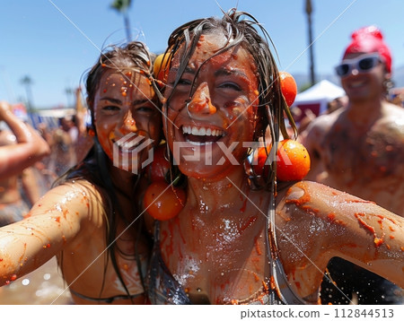 La Tomatina is an annual festival with a tomato fight with many peoples La Tomatina is an annual festival with a tomato fight with many peoples 112844513