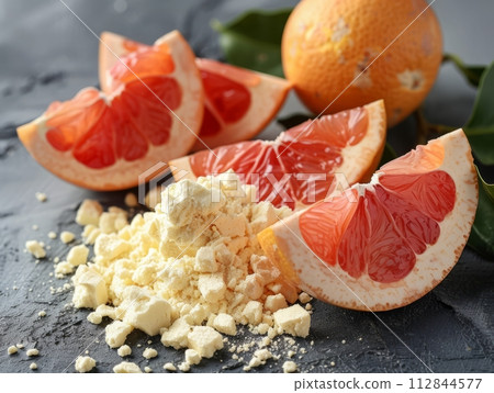 Citrulline is a non-essential amino acid on wooden with citrus 112844577