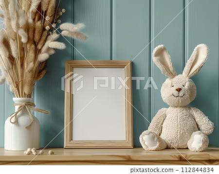 Picture frame mockup on a shelf, children's room in background 112844834