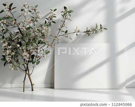 Minimalist mockup white invitation card with dry flowers on white 112845066