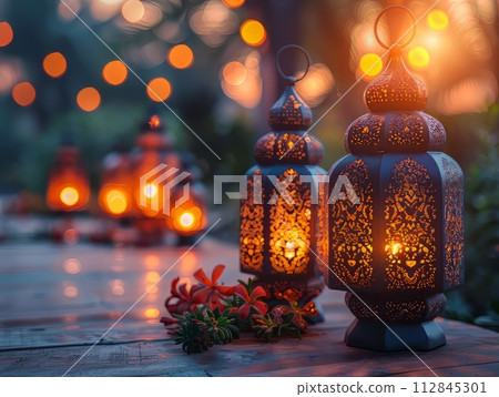 Lantern that have moon symbol on top of Ramadan Kareem. 112845301