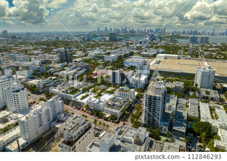 Miami Beach city American southern architecture. South Beach high luxurious hotels and apartment buildings. Tourist infrastructure in southern Florida, USA 112846293