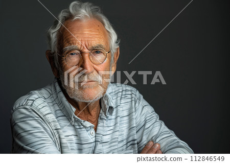portrait of smiling senior man in eyeglasses on a blurred background portrait of smiling senior man in eyeglasses on a blurred background 112846549